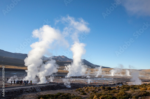 Tourists at the Geysers del Tatio (El Tatio), the third largest geyser field in the world, Andean Central Volcanic Zone, Antofagasta Region, Chile photo