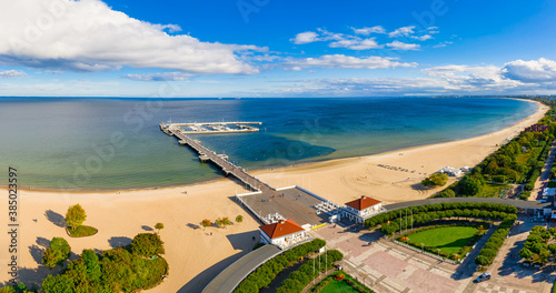 Fototapeta Naklejka Na Ścianę i Meble -  Aerial view of the Baltic sea coastline and wooden pier in Sopot, Poland