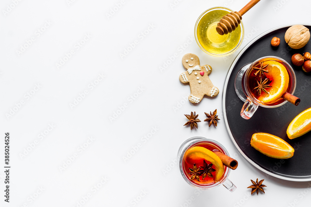 Christmas mulled wine with spices and oranges - winter hot drink