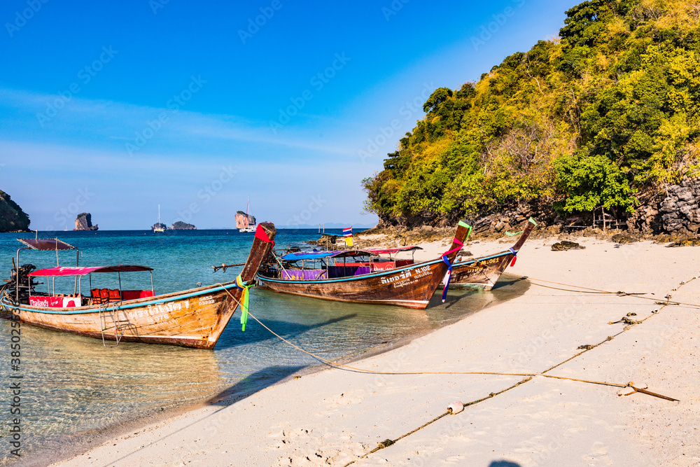 Longtail boats on Tup Island, Krabi Province, Thailand Longtail boats on Tup Island, Krabi Province, Thailand