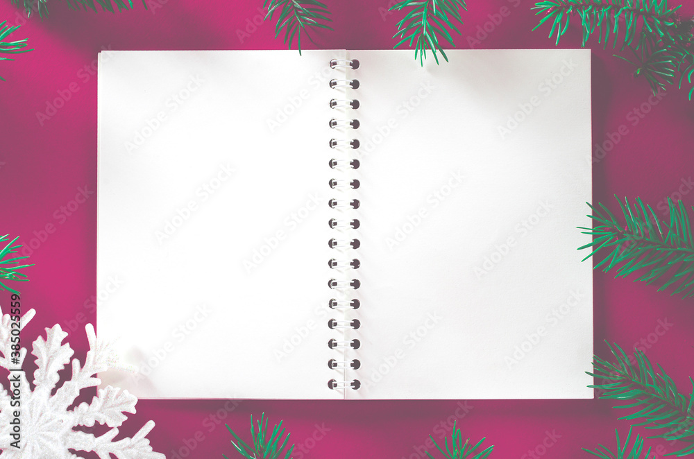 Frame of Christmas decoration on purple background Frame of Christmas decoration on purple background