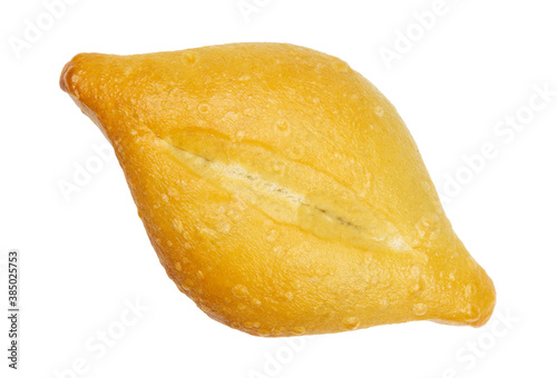 Single bolillo bread roll isolated on a white background. photo