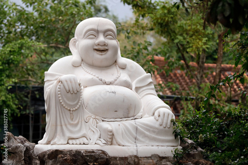 Thien Ung Buddhist temple, smiling Maitreya Buddha, big happy Maitreya Buddha statue, Quy Nhon, Vietnam, Indochina photo