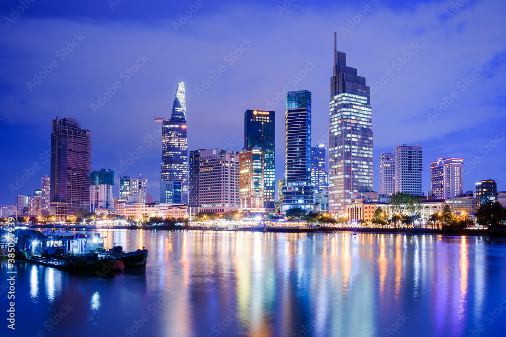 The night scenery of Ho Chi Minh City, Vietnam from across the bank of Sai Gon River.