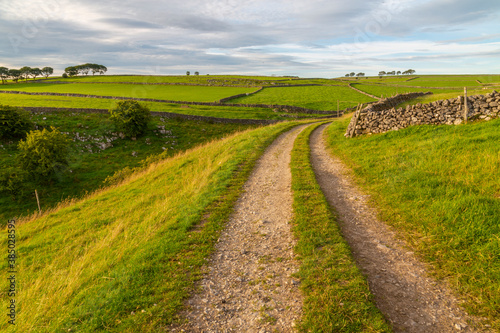 View of track and landscape near Whetton, Tideswell, Peak District National Park, Derbyshire, England, United Kingdom photo