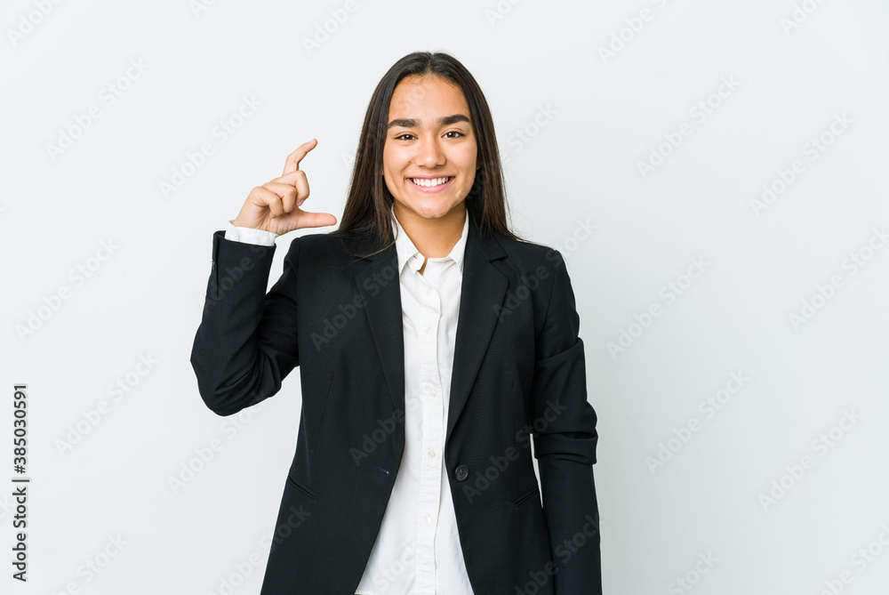 Young asian bussines woman isolated on white background holding something little with forefingers, smiling and confident. Young asian bussines woman isolated on white background holding something little with forefingers, smiling and confident.