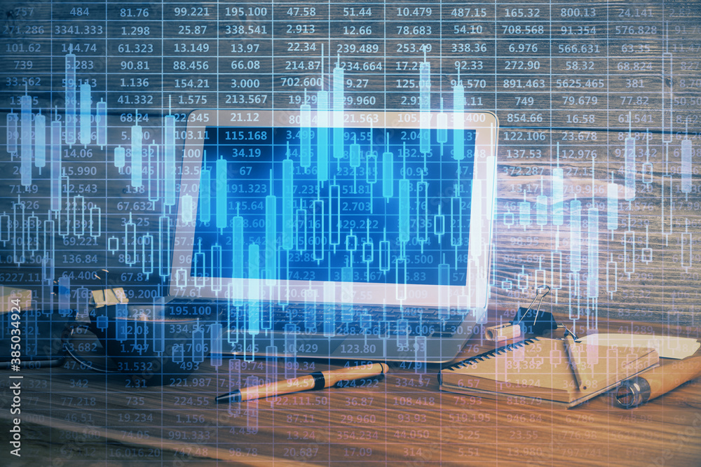 Double exposure of graph and financial info and work space with computer background. Concept of international online trading. Double exposure of graph and financial info and work space with computer background. Concept of international online trading.