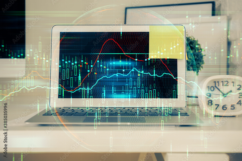 Double exposure of graph and financial info and work space with computer background. Concept of international online trading. Double exposure of graph and financial info and work space with computer background. Concept of international online trading.