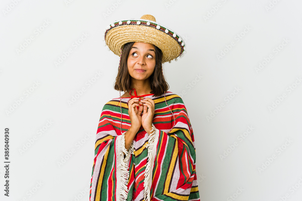 Young mexican woman isolated on white background
