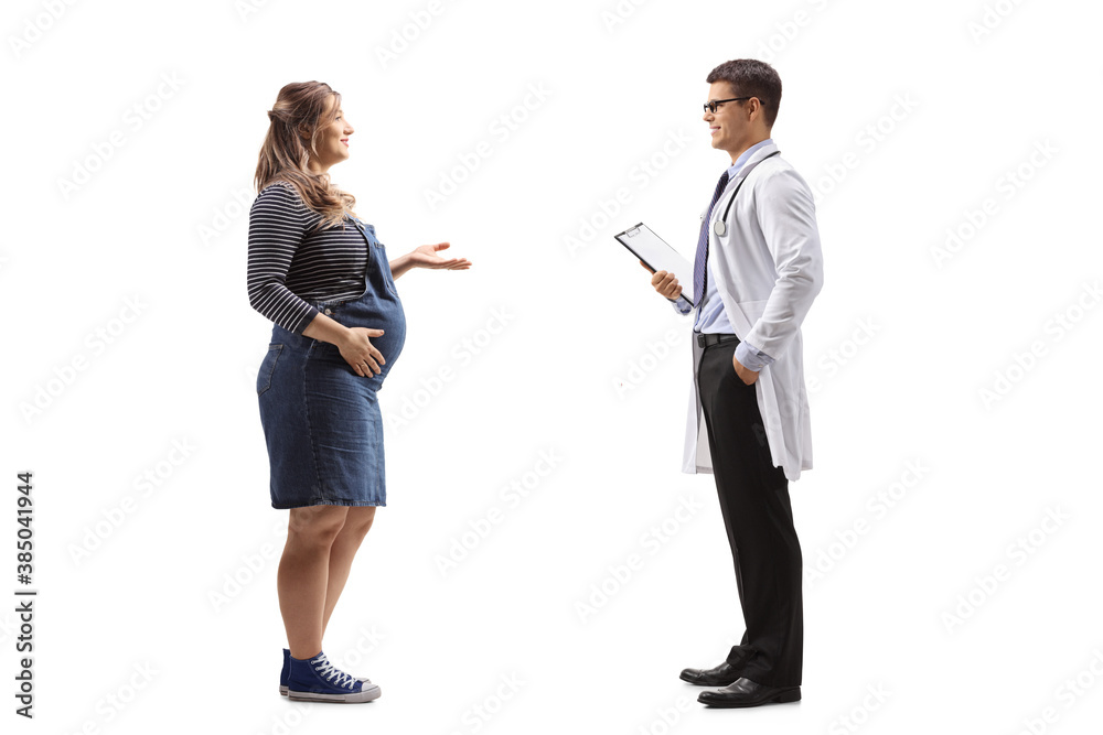 Full length profile shot of a pregnant woman talking to a young male doctor Full length profile shot of a pregnant woman talking to a young male doctor