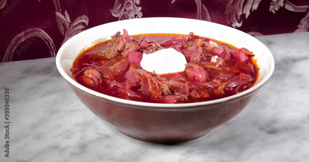 Adding sour cream to red borscht Adding sour cream to red borscht