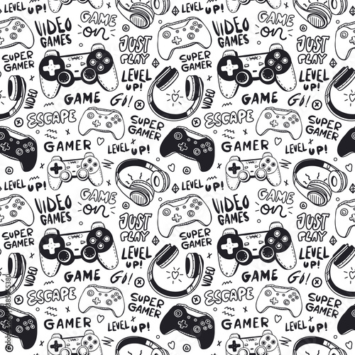 Tapety Seamless pattern with joysticks, text and headphones for a boy. Hand drawing, typography, cool background for game designs. Print for children's textiles, paper, T-shirts. Doodles and lettering.