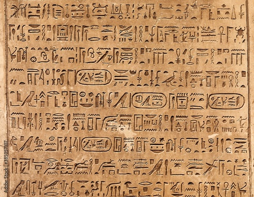 Photography Egiptian hieroglyphs carved in sandstone