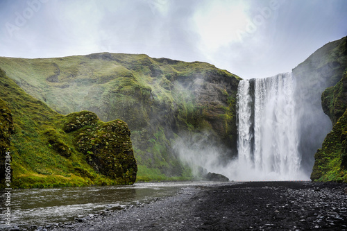 Beautiful Icelandic landscape, popular waterfall