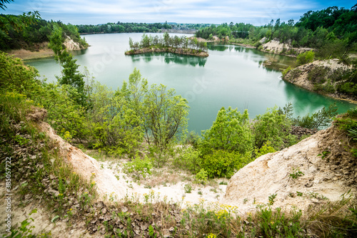 Beautiful landscape  blue lake with an island in the middle in the middle of the forest
