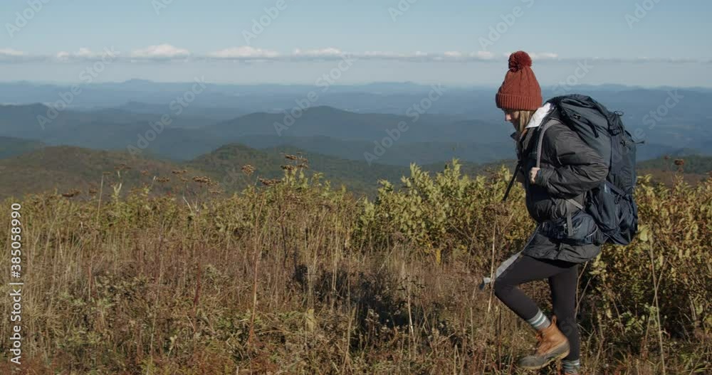 Girl backpacking on top of blue ridge mountains at Black Balsam Knob ...