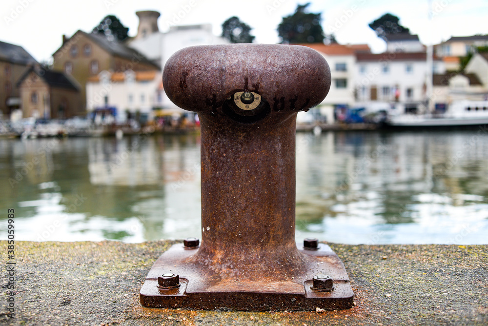 An old rusty murray in a seaside town in France. An old rusty murray in a seaside town in France.