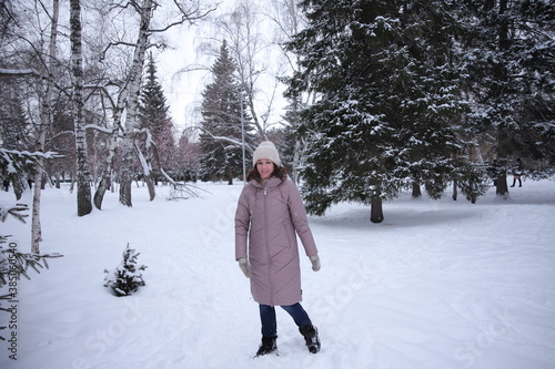 woman walking in winter park