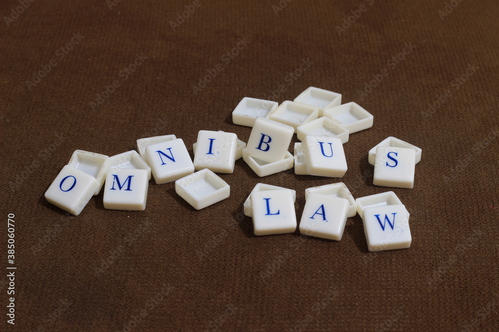 Illustration Photo for Omnibus Law, Blue Alphabet at Plastic Cube