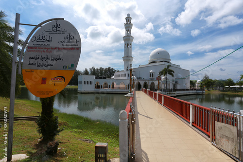 Malaysia, 1/1/2019: The Tengku Tengah Zaharah Mosque or the Floating Mosque is the first real floating mosque in Malaysia. It is situated in Kuala Ibai Lagoon, 4 km from Kuala Terengganu Town. photo