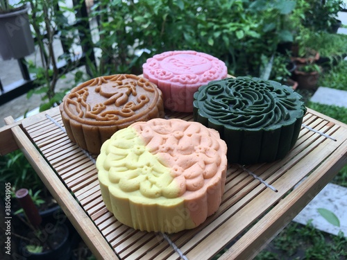 Peach moon cake, Yusu orange  moon cake, coffee mixed longan moon cake and walnut green tea moon cake photo