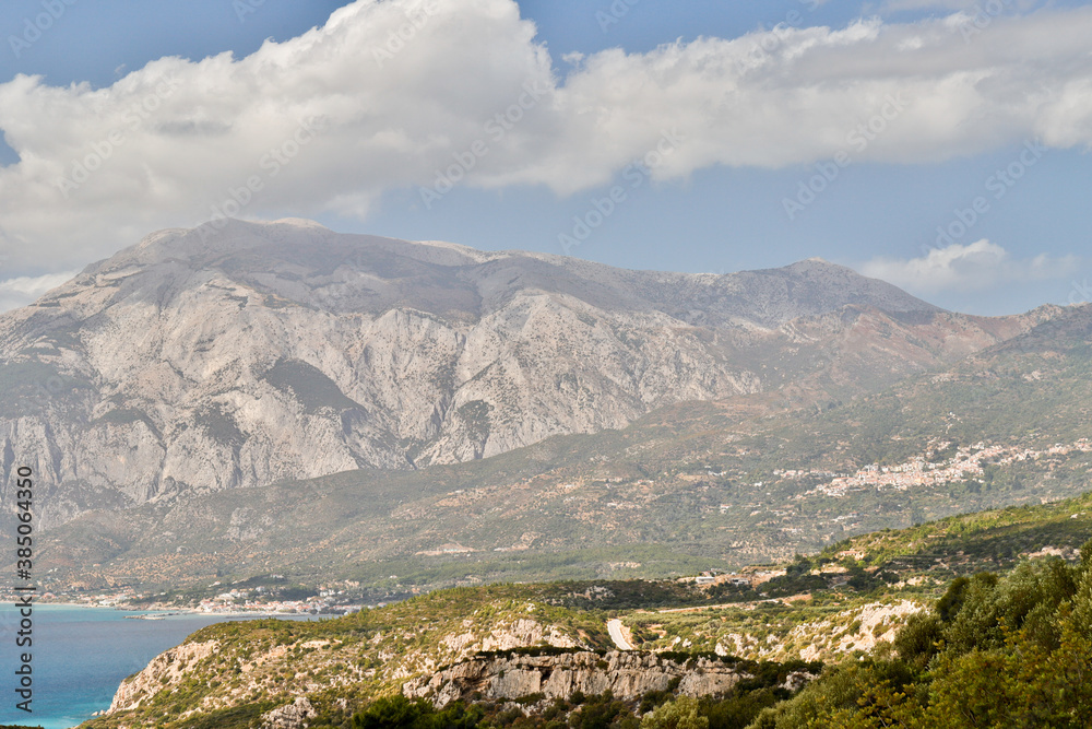 Panoramic view of the bay of Marathokampos on the Greek Aegean island of Samos with the Kerkis mountain range in the background.