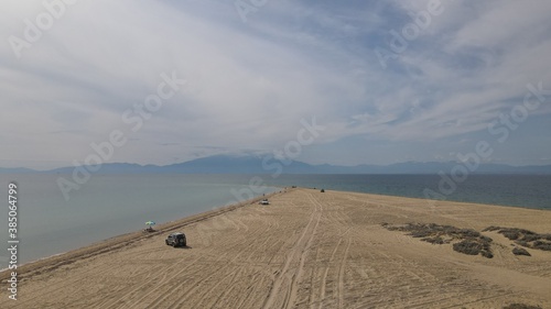 Drone photo over an amazing tropical beach in Epanomi, Chalkidiki, Greece photo