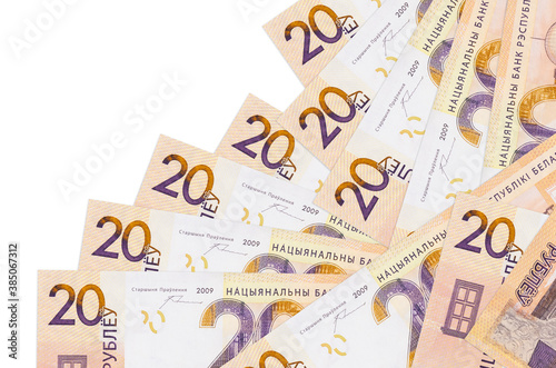 20 Belorussian rubles bills lies in different order isolated on white. Local banking or money making concept photo