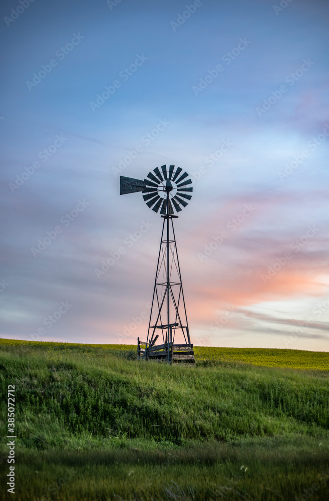 Rural Windmill at Sunset