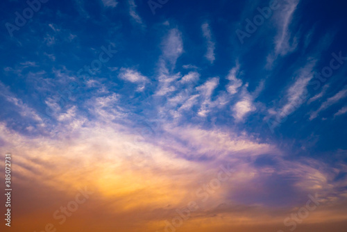 sunset sky with clouds background © pushish images