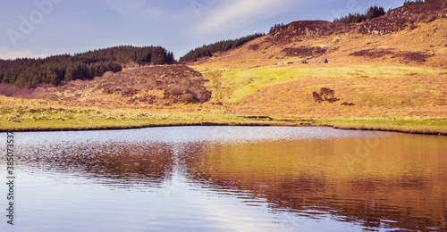 Mountain reflection on water - Isle of Skye, landscape of Scotland