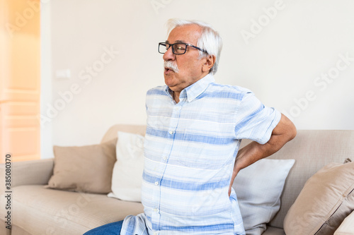 Senior man suffering from pain in back. Elderly man having discus hernia © Graphicroyalty