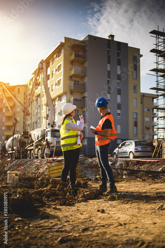 Construction workers having work meeting