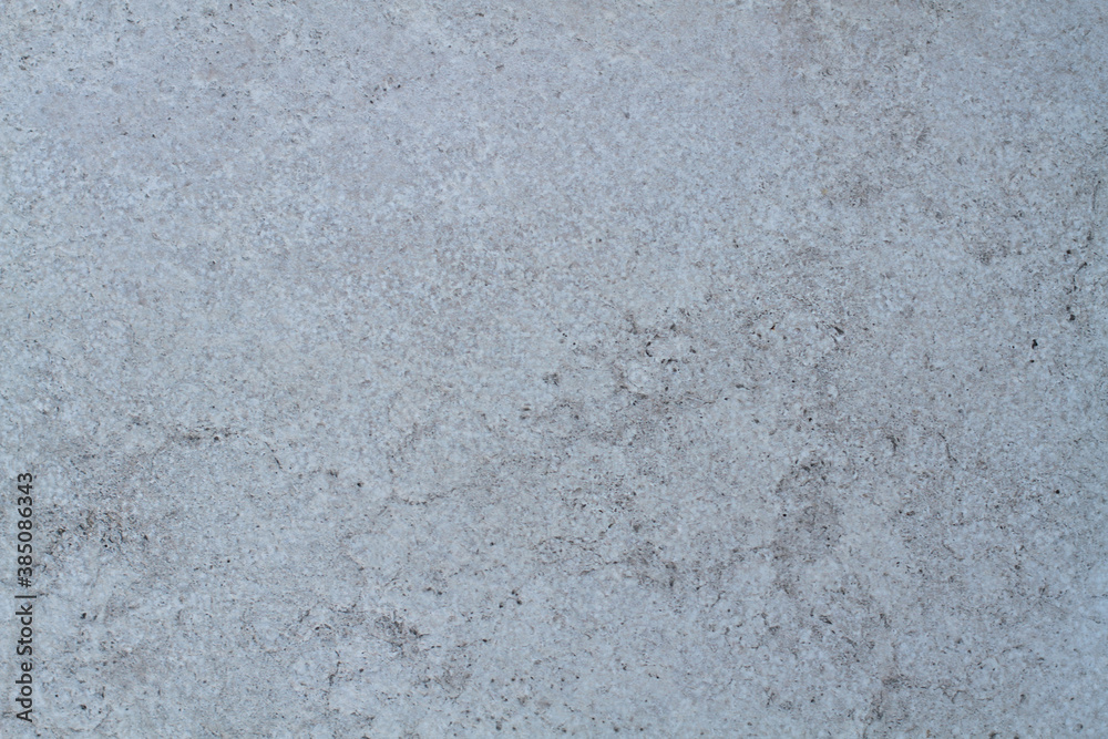 Obraz premium Natural stone texture. Travertine marble background. Rough stone processing
