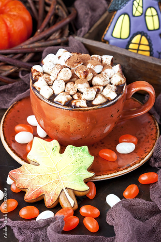 Autumn background, halloween holiday concept with cookies and hot chocolate