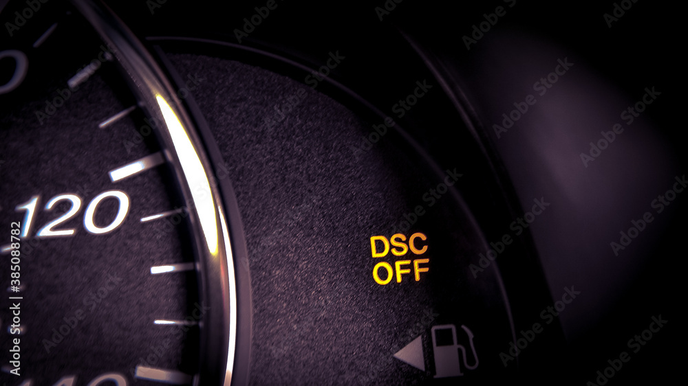 Close-up dashboard with DSC OFF warning light on Close-up dashboard with DSC OFF warning light on