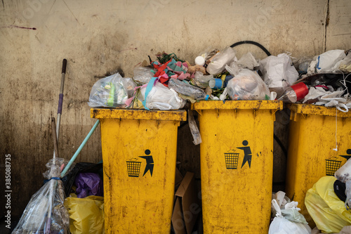 garbage bins full of plastic wastes