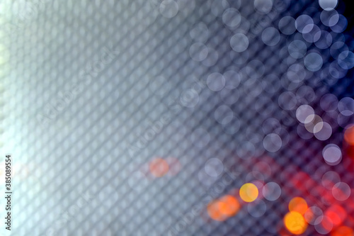 Bokeh processing from reflections on soundproof wall panels in karaoke rooms