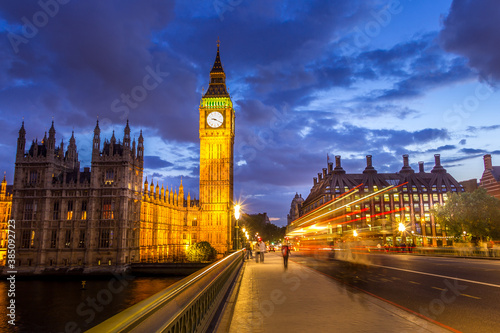 The Parliament, the Big Ben and the Westminster bridge at night, London, England