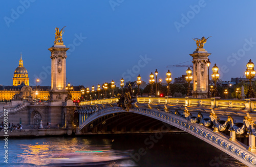 Alexander III Bridge and Les Invalides in Paris at night