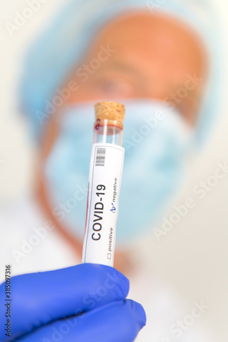 Doctor with covid-19 test