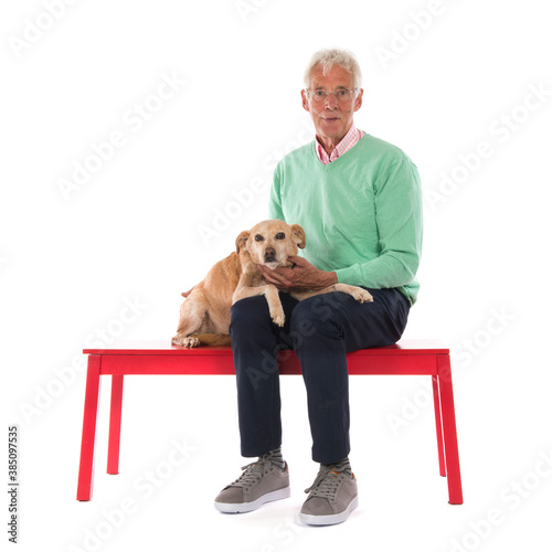 Old man with senior dog photo