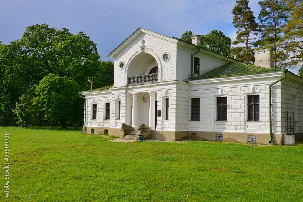 Kachanivka, Ukraine - June 2020: Beautiful ancient Tarnovsky palace and park in Kachanivka. Ukrainian heritage, tourist attractions. Landscape and park design