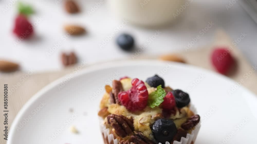 Mixed berry low carb Keto Diet muffin with almond and nut. set on cafe table. Mixed berry low carb Keto Diet muffin with almond and nut. set on cafe table.