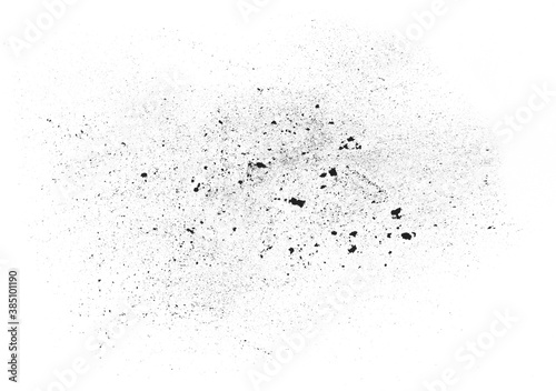 Black powder (Charcoal powder) scattered. Isolated on white background. A loose heap of fine Powdered charcoal. 