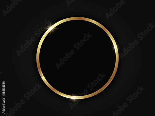 Round golden sparkling frame isolated on a black background.