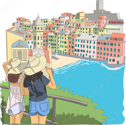 Two girls tourists look at the village Vernazza.