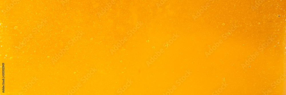 Texture of natural golden honey, food background. Texture of natural golden honey, food background.