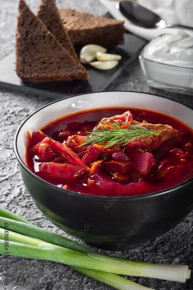Borsch. Ukrainian soup. The red soup. Borscht with sour cream and onions, rye garlic bread. Traditional Russian borscht with sour cream. Borsch. Ukrainian soup. The red soup. Borscht with sour cream and onions, rye garlic bread. Traditional Russian borscht with sour cream.