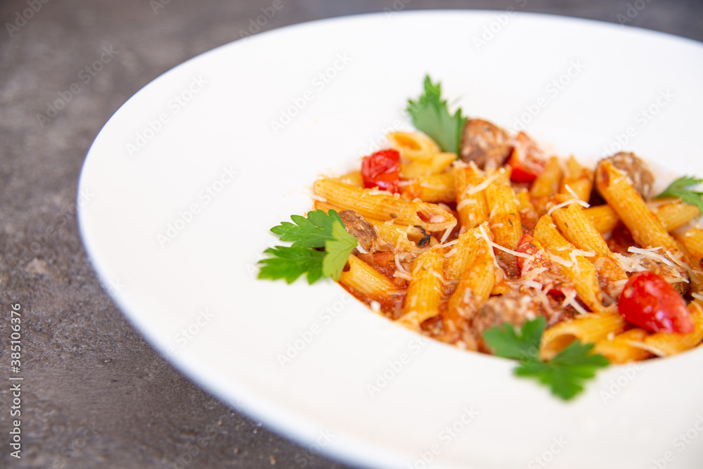 pasta with herbs in a white plate pasta with herbs in a white plate